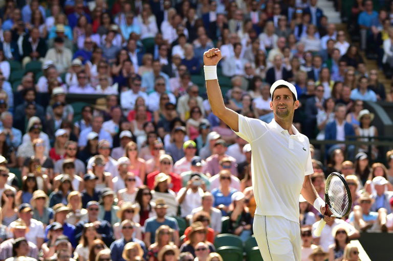 Djokovic into Wimbledon semi-final, blasts 'unnecessary' warnings