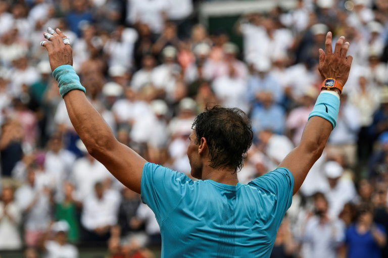 Nadal wins 11th French Open despite late injury scare