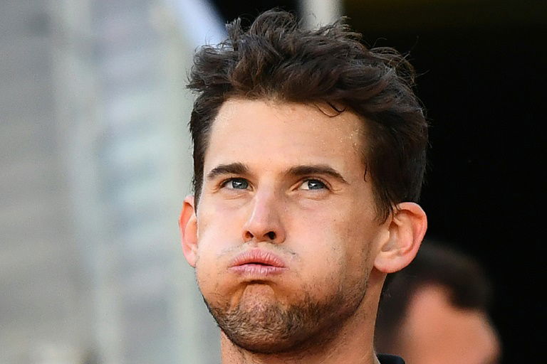 Thiem ends Federer's clay court return, Halep edges closer to top spot