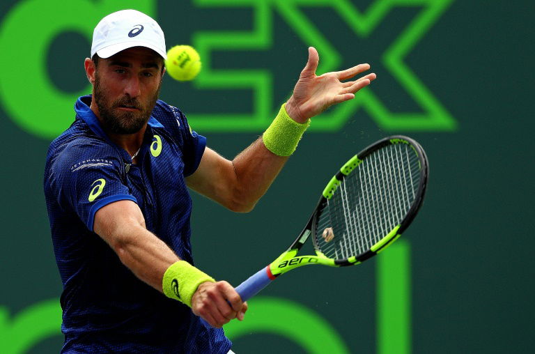 Johnson outlasts Sandgren to repeat as US Clay champion