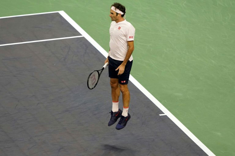 Federer does family proud to battle into Shanghai quarters
