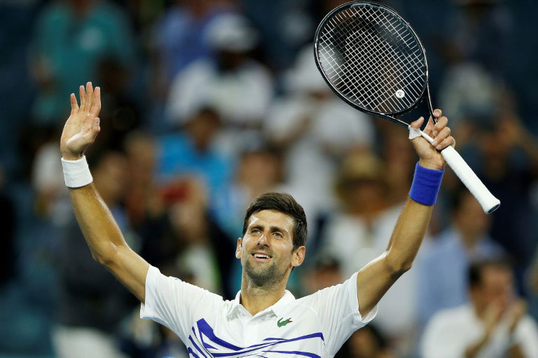 Djokovic downs Delbonis, Halep battles into Miami 4th round