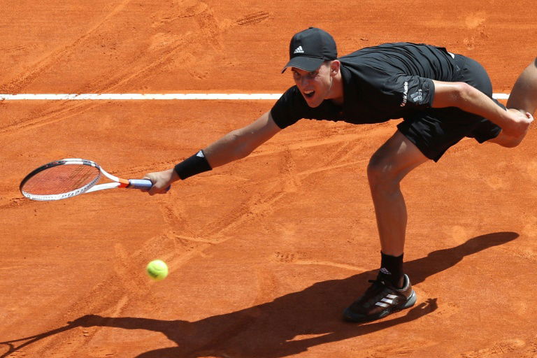 Thiem saves match point in victory over Rublev